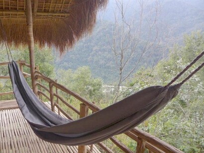 Minimalist bamboo & wood Adi tribal architecture lures you for a siesta
