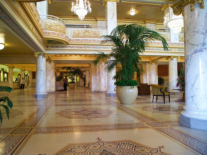 The French Lick Resort lobby filled with intricate mosaics and sparkling chandeliers, symbolizing the resort's elegance and hospitality