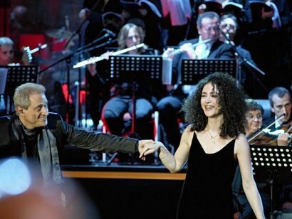 Maria Dangell with Amedeo Minghi  
