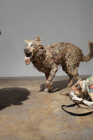 Biro and Artie with His Stick, 2015. Wood, wire newspaper, tape, glue, matte medium, UV matte varnish, 42 x 30 x 10 inches and 22 x 12 x 48 inches