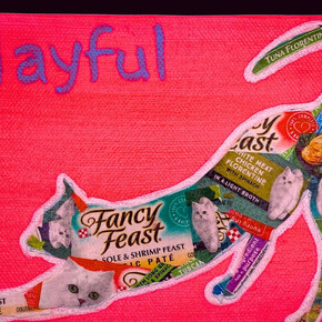 Susan Spangenberg, Playful Cat Food Kitty, 2022, Acrylic and cat food label collage on canvas,5 × 7 in | 12.7 × 17.8 cm. Courtesy of Fountain House Gallery