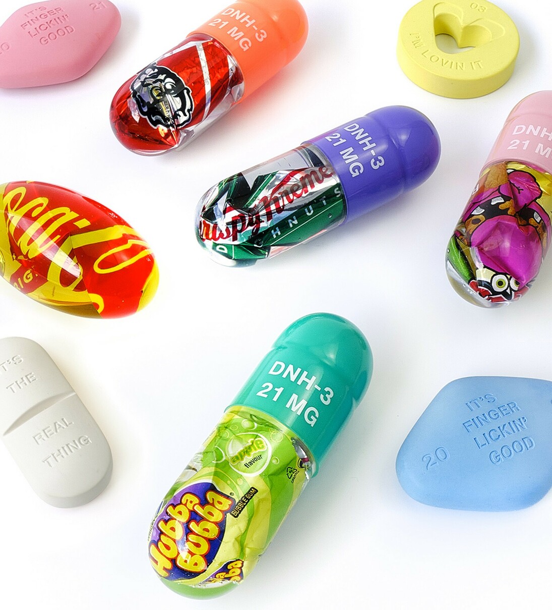 Miss Bugs, Junk caps, polyurethane UV resin + pigment with encapsulated discarded food wrapper, 13x4.50x4.50 cm