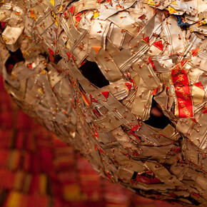 El Anatsui, AG + BA (detail 2), 2014 Installation, Aluminium and copper wire and nylon string, dimensions variable, Photo Jonathan Greet, Image courtesy October Gallery London