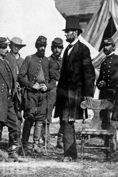 President Abraham Lincoln meets with General George McClellan on the battlefield of Antietam in Maryland, 1862