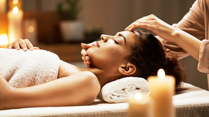 The therapeutic touch of an Ayurveda practitioner provides holistic healing, focusing on restoring harmony between mind, body, and spirit