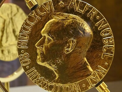 The Nobel Peace Prize medal, a global symbol of peace and honor President Jimmy Carter's 2002 Nobel Peace Prize