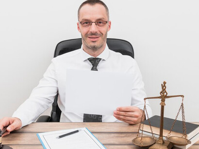 The intricacies of antitrust laws, regulation, and government intervention amidst the landscape of competition and market dynamics, as a lawyer guides a client through the realm of technological innovation