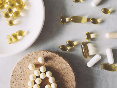 Various medications displayed on separate plates arranged on a table - Depicting diverse treatment options for managing obsessive-compulsive disorder (OCD)