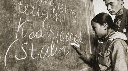 In 1934, in a Kazakh school within the Soviet Socialist Republic of Uzbekistan (SSRU), students gathered in a modest classroom, their lessons shaped by the rapidly changing political landscape of the time
