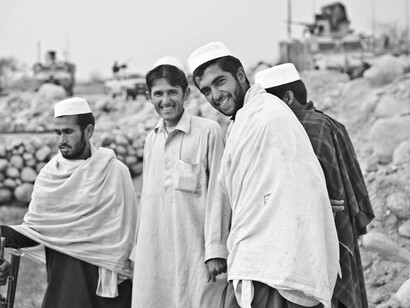 Muslim men smile at the prospect of immigrating to the western part of the world but know it's an uphill climb to achieve it 