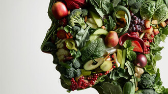 A human head filled with healthy foods and artificial intelligence, representing the fusion of functional foods and biohacking nutrition