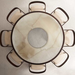 Round Dining Table and Curved Back Chairs by Joaquim Tenreiro at R & Company