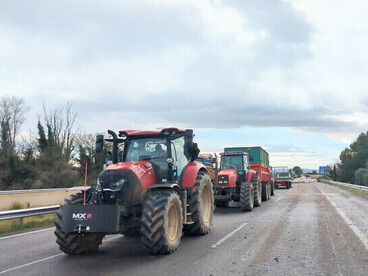 Members of the "Peasant Revolt" movement blocked the A7 motorway in Garrigàs, Spain, to express their opposition to Mercosur