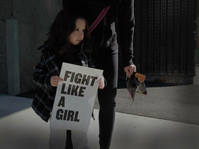 A young feminist girl fighting for her rights in the cold streets of Washington D.C.