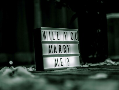 A sign acting as a marriage proposal
