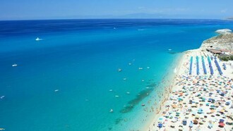 Amazing beach, full of people, in Calabria