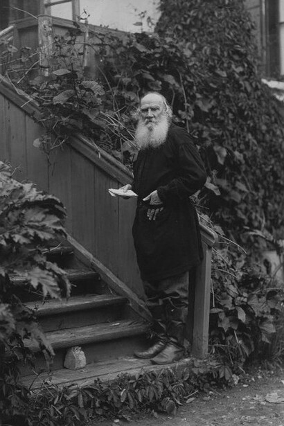 In 1910, Leo Tolstoy stood on the stairs leading to the balcony, holding a letter in his left hand, Russia