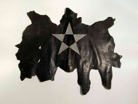 Gilberto Zorio, Aluminium Star on Skin, 2006, Cow skin, aluminium, 400 x 330cm, Image Courtesy of the Artist and Blain|Southern