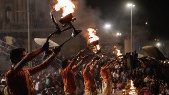 People holding torches in Dasaswamedh, UP, India


