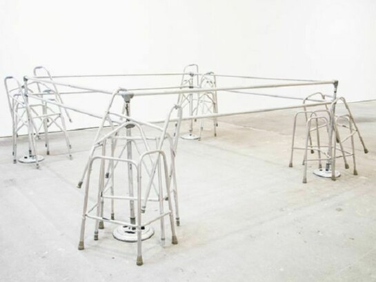 Cady Noland, Frame Device, 1989, Pipes, stanchions, 12 walkers. 132 x 132 x 54 in. (335.3 x 335.3 x 137.2 cm). Gaby and Wilhelm Schürmann, Herzogenrath, Germany; courtesy David Zwirner, New York. Courtesy of the artist and David Zwirner Gallery, New York.