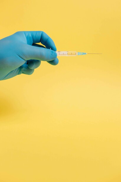 Man holding vaccine