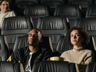 A conceptual image of an AI as a film director, guiding a futuristic production