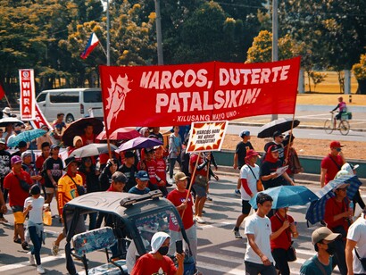 Protesters carrying bold calls for justice during a peaceful demonstration, symbolising the growing frustration of Filipinos seeking transparent and accountable governance