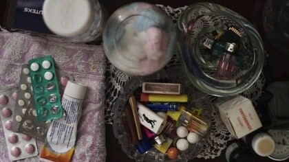 A variety of illicit substances scattered upon a coffee table