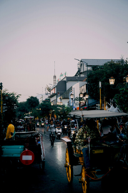 Scooter rider navigating the lively roads of Canggu, Bali