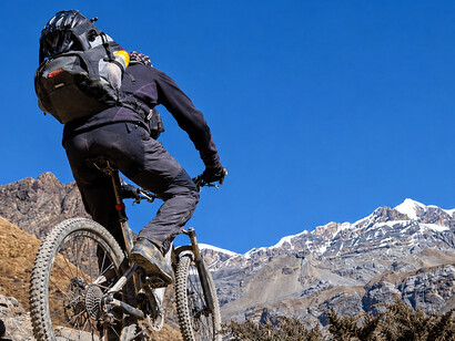 Mountain biking on Nepal’s Annapurna Circuit offers adventure amid the breathtaking scenery of the Himalayas