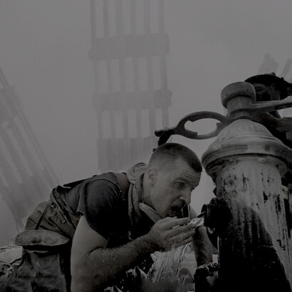 A firefighter amongst rubble at the twin towers