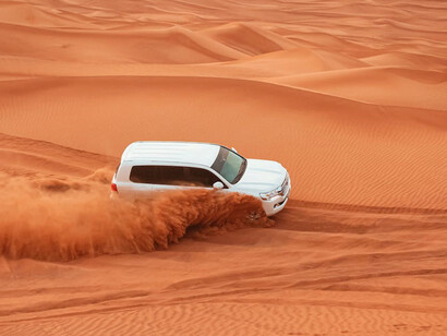 Embark on an exhilarating desert safari adventure in Dubai, United Arab Emirates, with rugged 4x4 vehicles