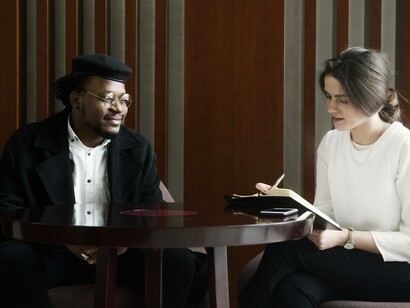 A man being interviewed for a job by a female HR representative