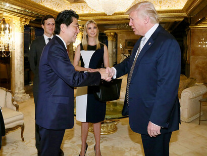 Abe and Trump shaking hands