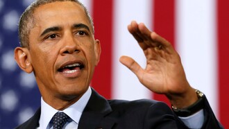 Barack Obama saludando