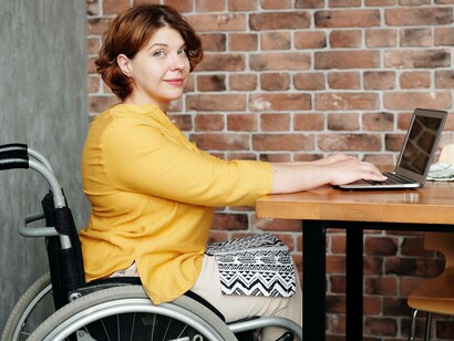 Woman on a wheelchair hard at work