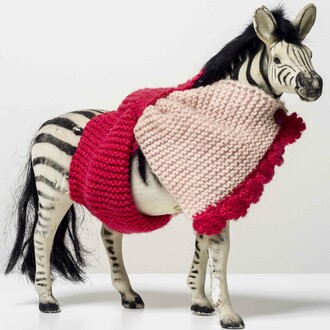 Feliciano Centurión, Familia de caballos, c.1990, Plastic toy animal with crochet wrap 10 x 15 x 5 cm. Photo: Eva Herzog, Courtesy of Cecilia Brunson Projects.
 