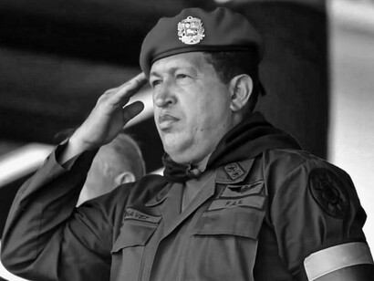 Former President of Venezuela Hugo Chávez saluting
