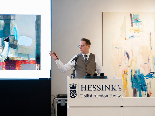 An auctioneer leads bidding during Hessink’s landmark contemporary art sale in Tbilisi, an event that marked a major turning point in the international recognition of Georgian modern and contemporary art, Georgia
