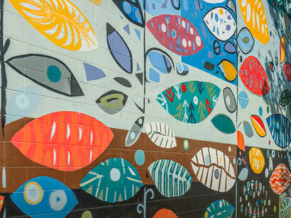 Art spills into the streets, turning the neighborhood into an open-air gallery