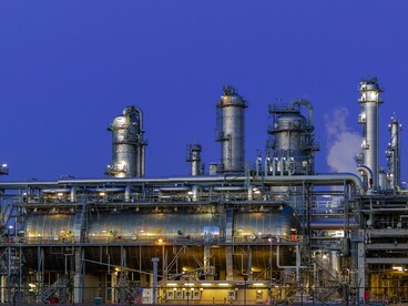 A big network of industrial towers and pipelines, reflecting the infrastructure countries seek to protect during shifting global alliances