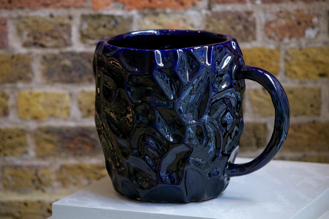 Installation view of Many a Slip, invited artists juggle with the domestic symbol of 'the cup' (2015), focus on Matthew Raw 'The Poisoned Chalice' at Marsden Woo Gallery, image © Philip Sayer, courtesy of Marsden Woo Gallery, London