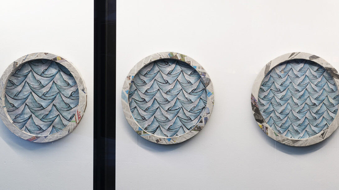 Sam Porritt, A Matter of Perspective (Triptych), 2018. Brush, ink and wax crayon on paper. Card, plaster, papier-mâché. Frame. 82 cm (diameter) x 7.5 cm each.

