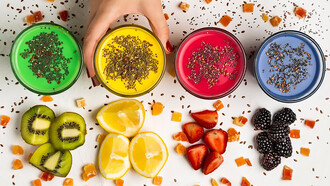 Smoothie bowls topped with fresh fruits, vibrant glasses of colorful smoothies, and refreshing fruit-infused beverages make for delicious and healthy breakfast options