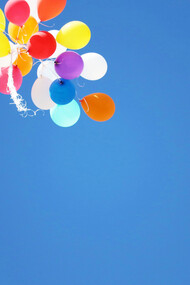 Balloons finding their way upwards, not held down by unnecessary burden