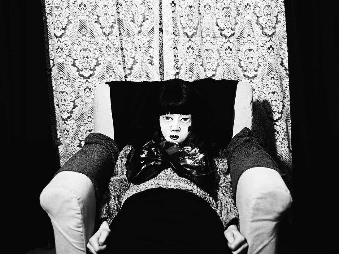 Sarah Pucill, Doll Seated, 2013, Photographic print from negative. Copyright of Sarah Pucill