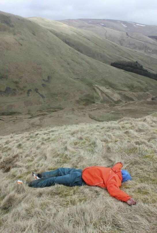 Photograph from The Nation//Live – Civil War, A participant re-enacts the death of a Covenanter at the Devil’s Beef Tub, nr. Moffat, © National Galleries of Scotland and Atlas Arts 2013