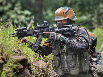 Indian Army personnel of the White Knight Corps equipped with a modified AK-type rifle