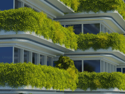 A gray concrete building is surrounded by trees, in Singapore