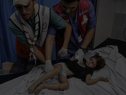 Wounded Palestinians wait for treatment at the overcrowded emergency ward of Al-Shifa hospital in Gaza City following an Israeli airstrike on October 11, 2023
